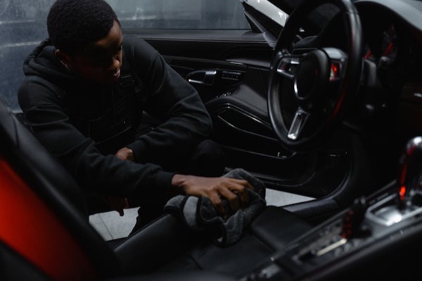 Interior detailing with professional leather cleaning treatment